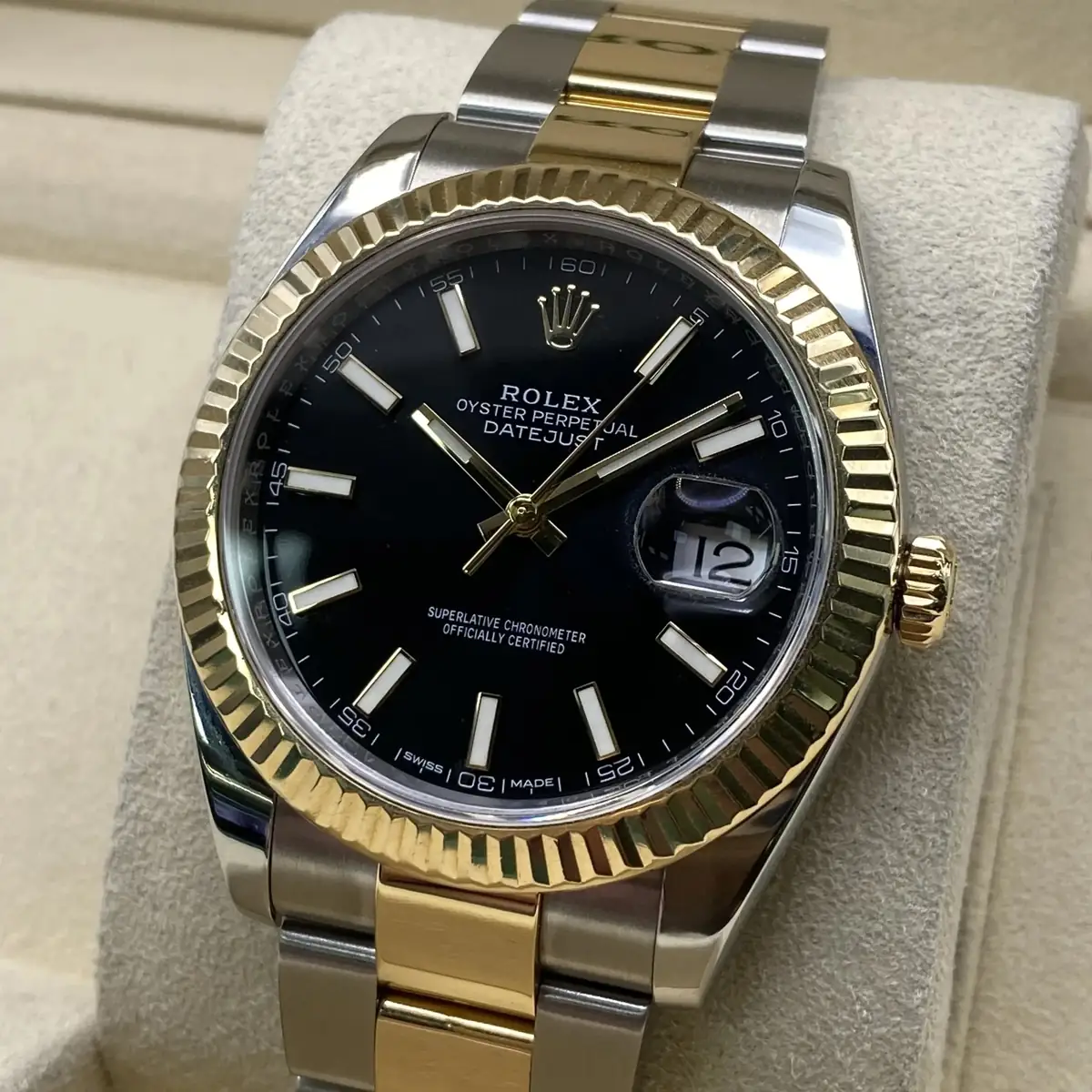 Rolex Datejust 41 with a black dial, fluted bezel, and two-tone steel and yellow gold Oyster bracelet_4.webp