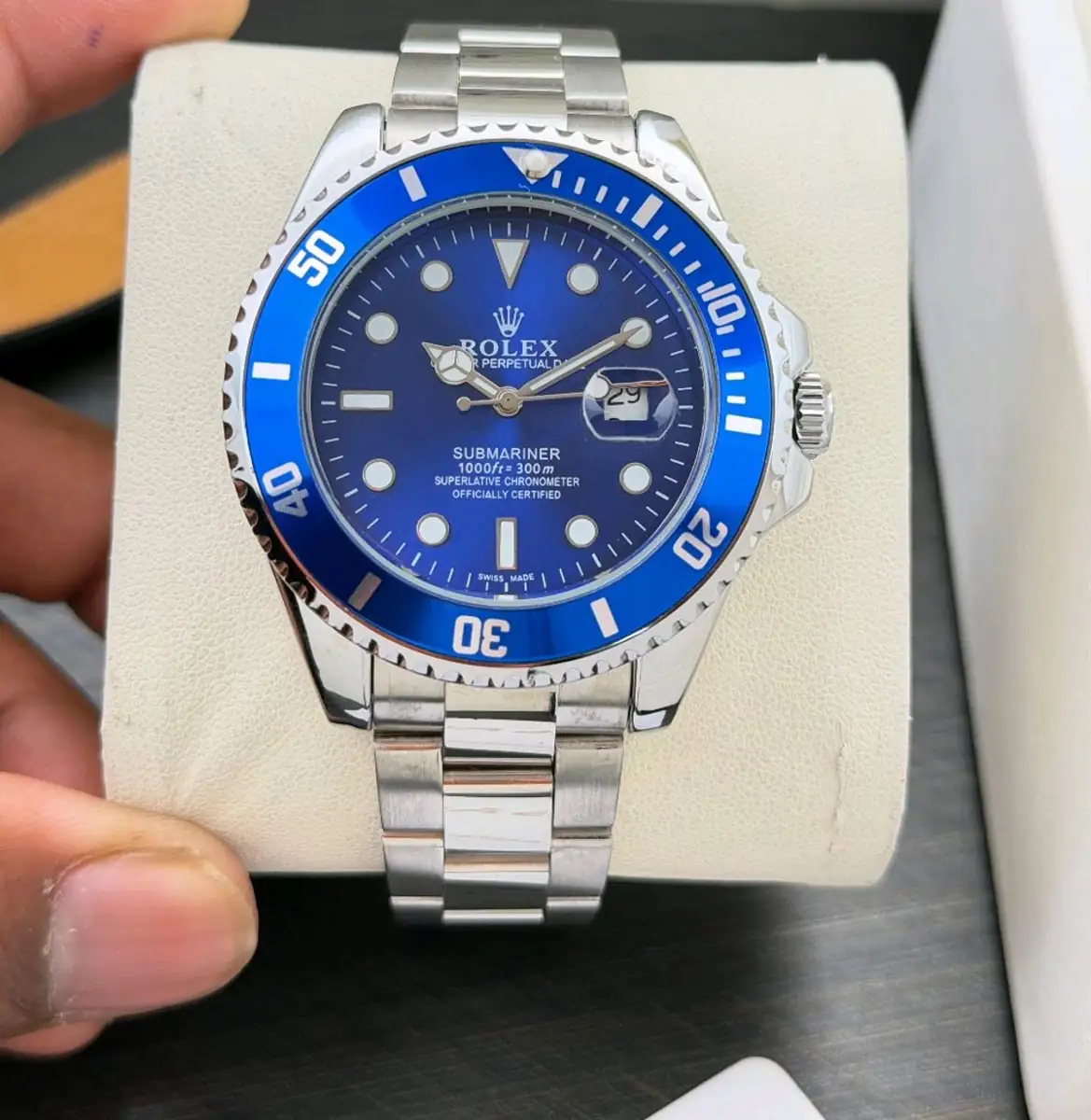 Rolex Oyster Perpetual Submariner Date watch with a blue Cerachrom bezel_4.webp