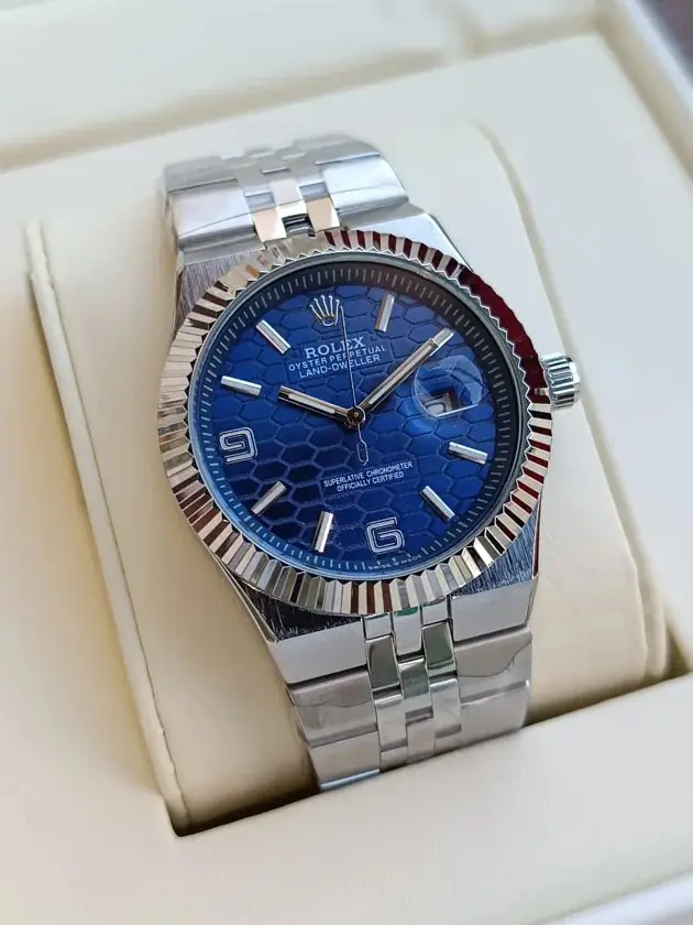 Rolex Oyster Perpetual Land-Dweller with a blue honeycomb dial and a fluted bezel_3.webp