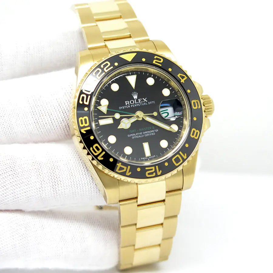 GMT-Master II in 18 ct yellow gold with a black dial and a yellow bracelet (3).webp