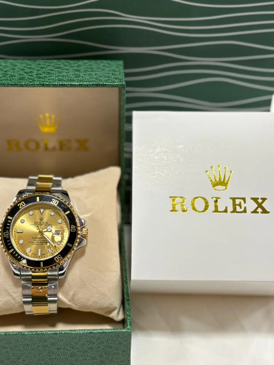 Rolex Submariner Date watch in two-tone Oystersteel and yellow gold with a black Cerachrom bezel and a gold dial_1.webp