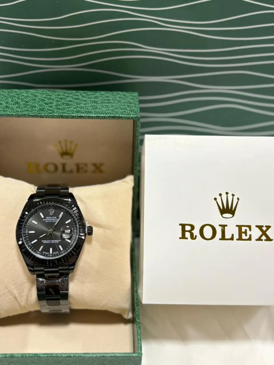 Rolex Datejust all black watch in an Oyster-style bracelet.webp