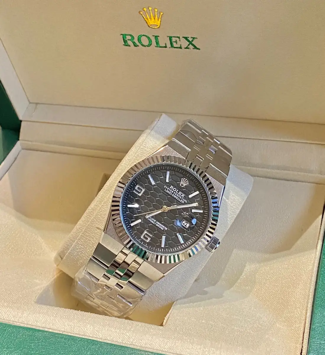 Rolex Land-Dweller watch with a black dial and a Jubilee bracelet.webp