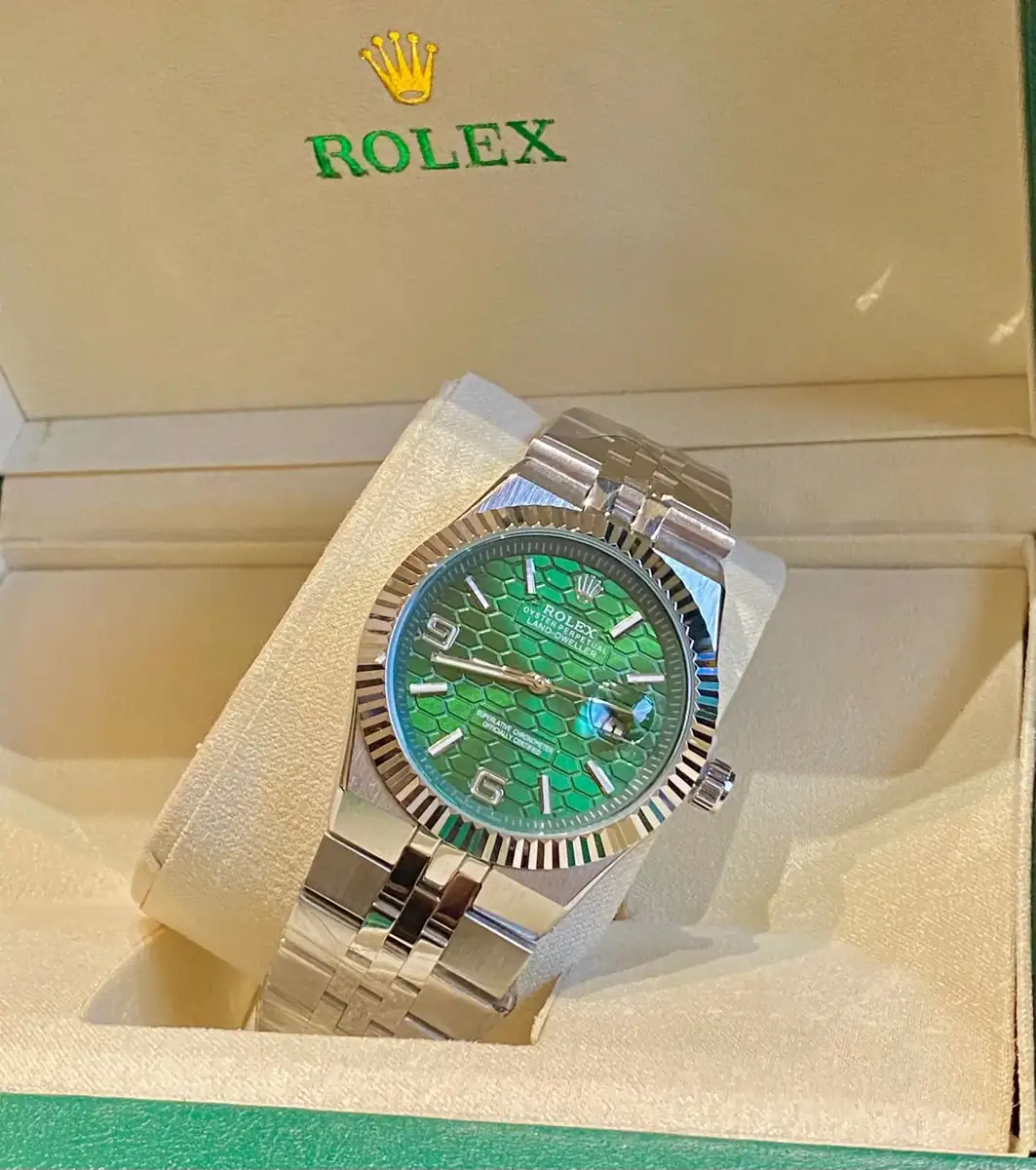 Rolex Oyster Perpetual Land-Dweller watch with a green honeycomb dial.webp