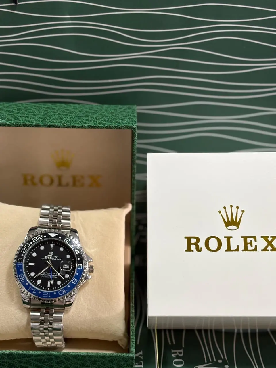 Rolex GMT-Master II in Oystersteel with a black dial and a Jubilee bracelet.webp