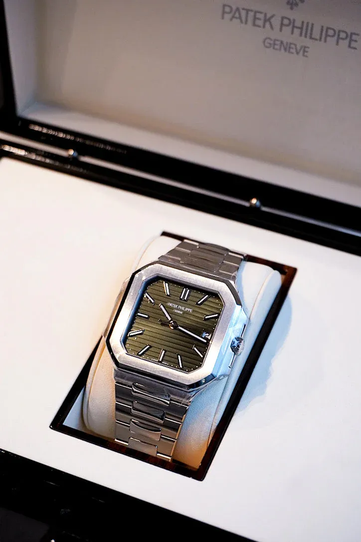 Patek Philippe Cubitus, featuring an olive green dial and a stainless steel case and bracelet.webp