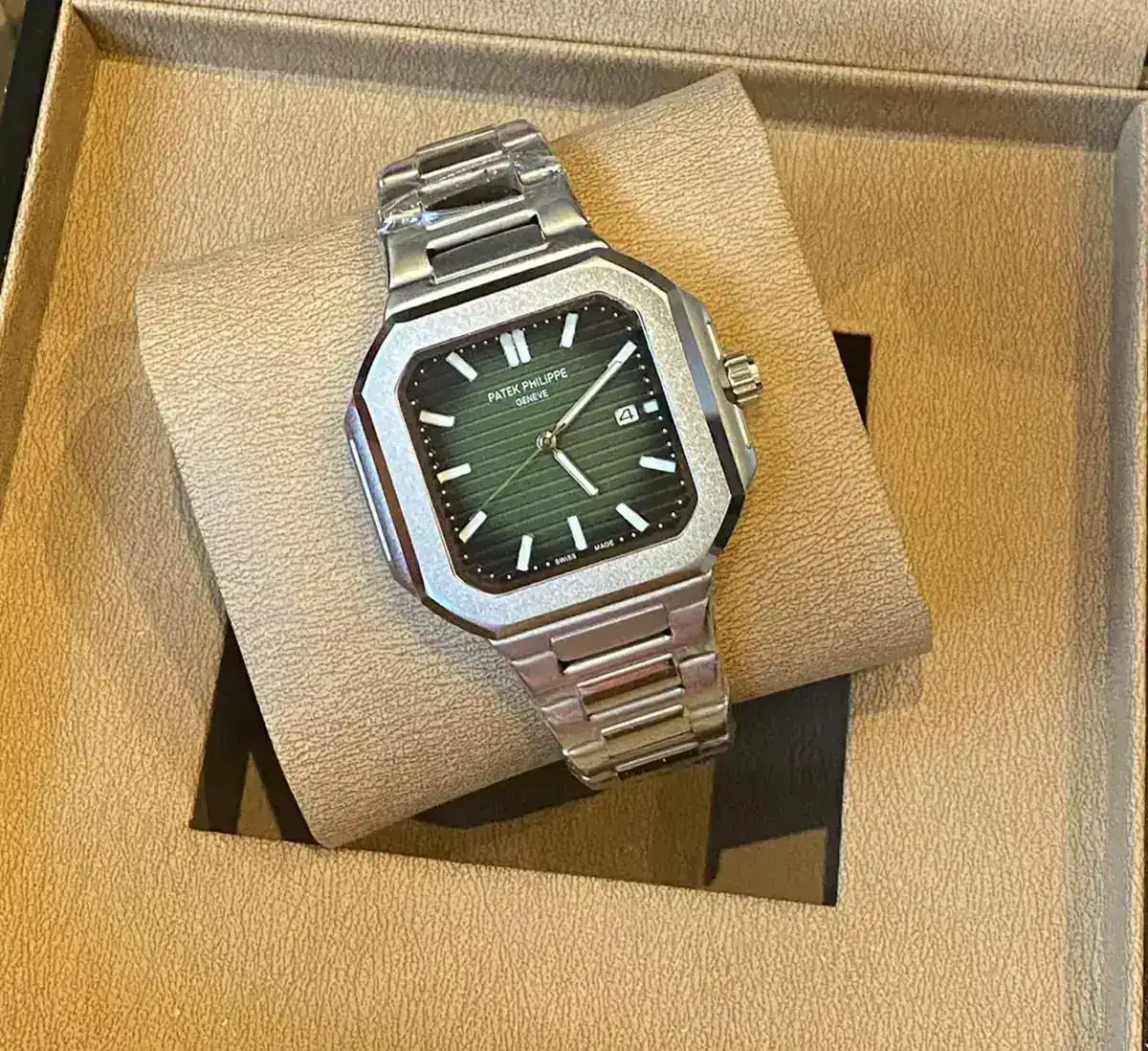 Patek Philippe Cubitus, featuring an olive green dial and a stainless steel case and bracelet_2.webp