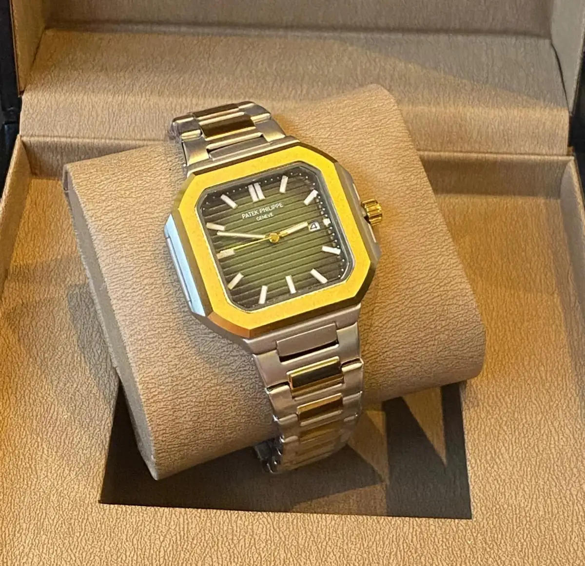 Patek Philippe Cubitus watch, reference 5821_1A-001, crafted from stainless steel with a green sunburst dial_2.webp