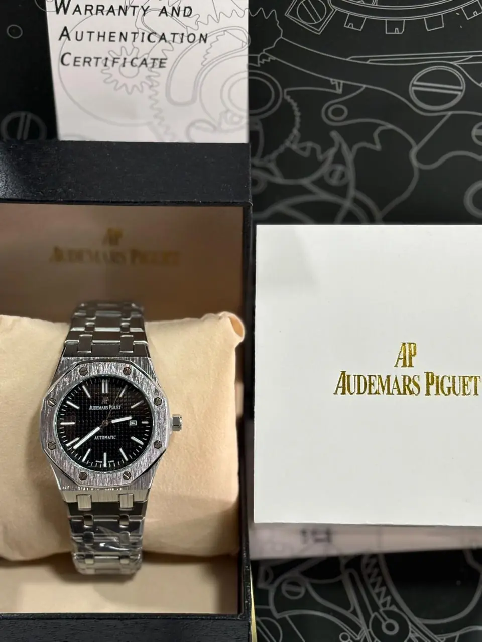 Audemars Piguet Royal Oak selfwinding watch with a black dial and stainless steel case and bracelet_1.webp