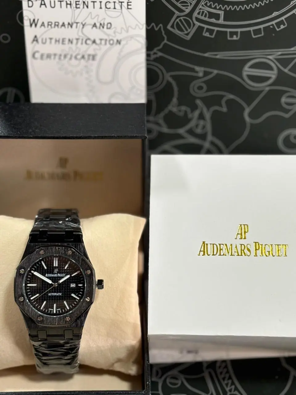 Audemars Piguet Royal Oak watch in a full black finish and black dial_2.webp