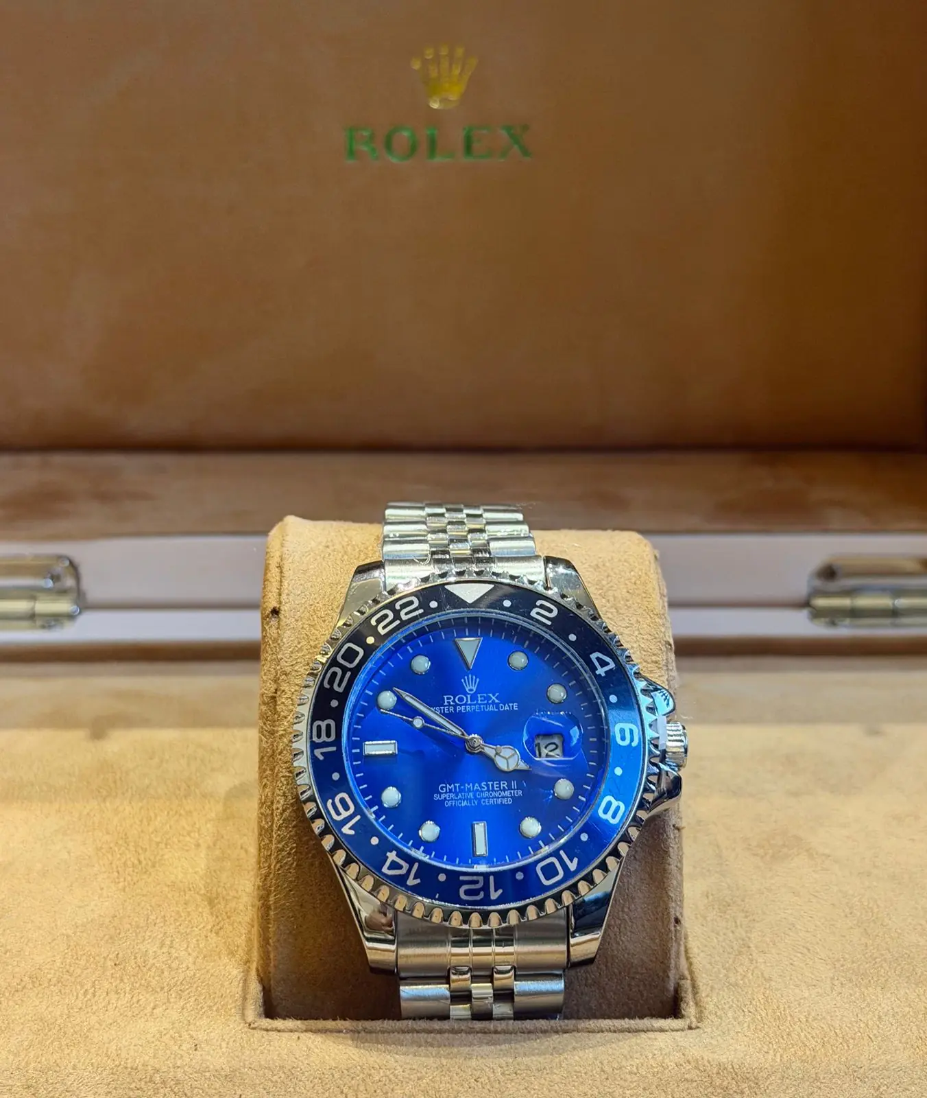 Rolex GMT-Master II watch featuring a blue dial and a blue and black ceramic bezel_1.webp