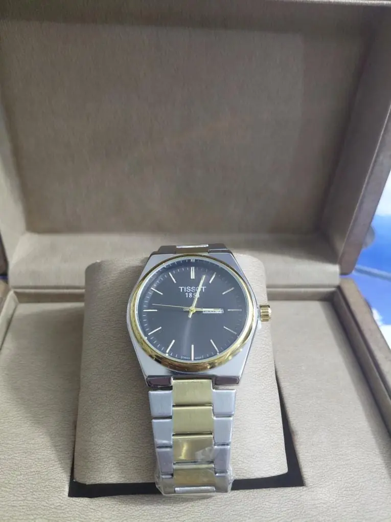 Tissot PRX watch with a black dial and a two-tone stainless steel bracelet_2.webp