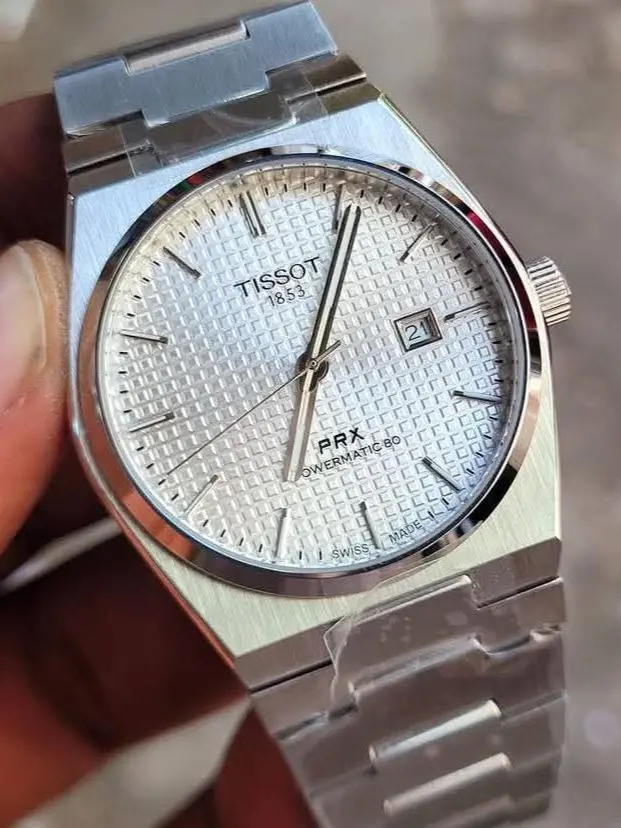 Tissot PRX 35mm Powermatic 80 watch with a white dial and a stainless steel bracelet_2.webp