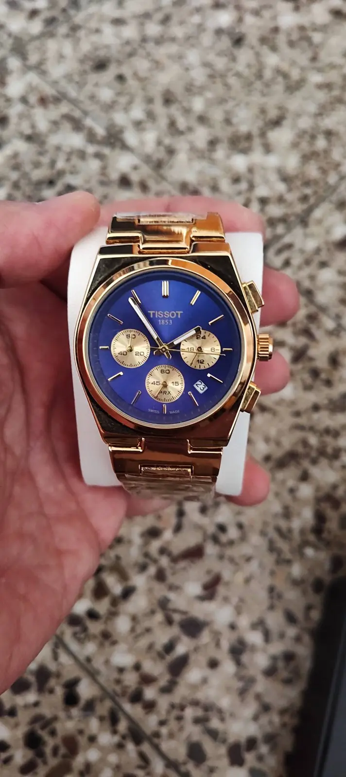 Tissot PRX Chronograph gold-tone watch with a blue dial_1.webp