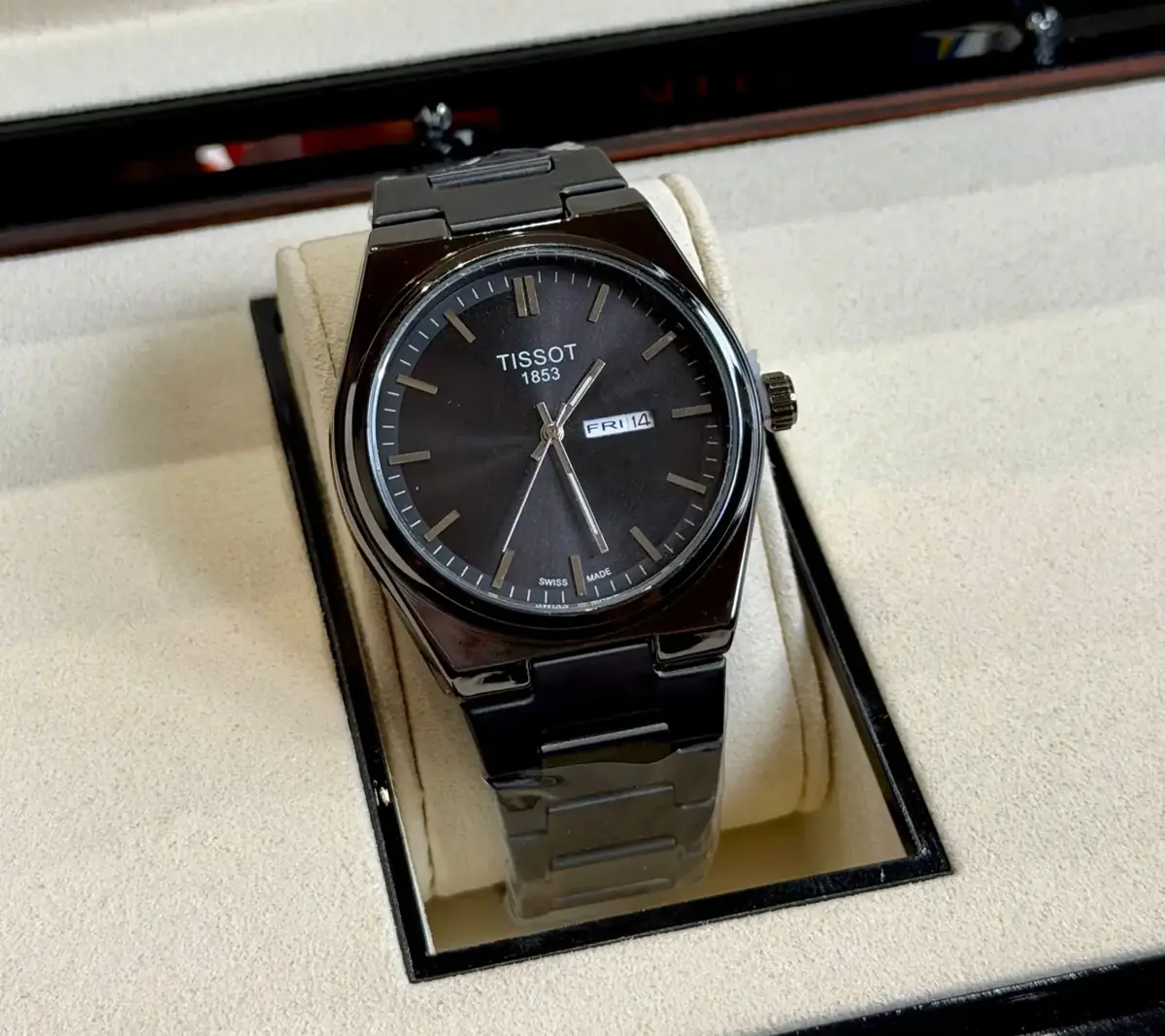 Tissot PRX 42mm Black Waffle Dial and a Black PVD-coated Stainless Steel