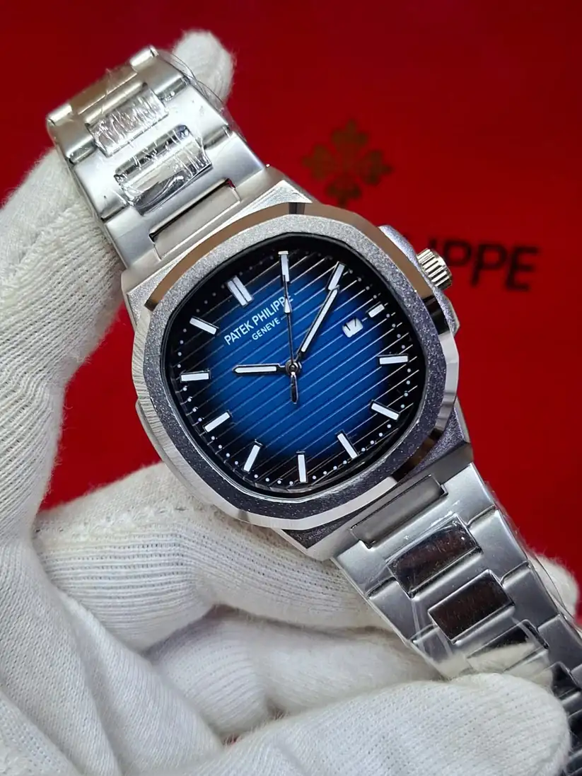 Patek Philippe Nautilus watch with a blue dial and stainless steel bracelet