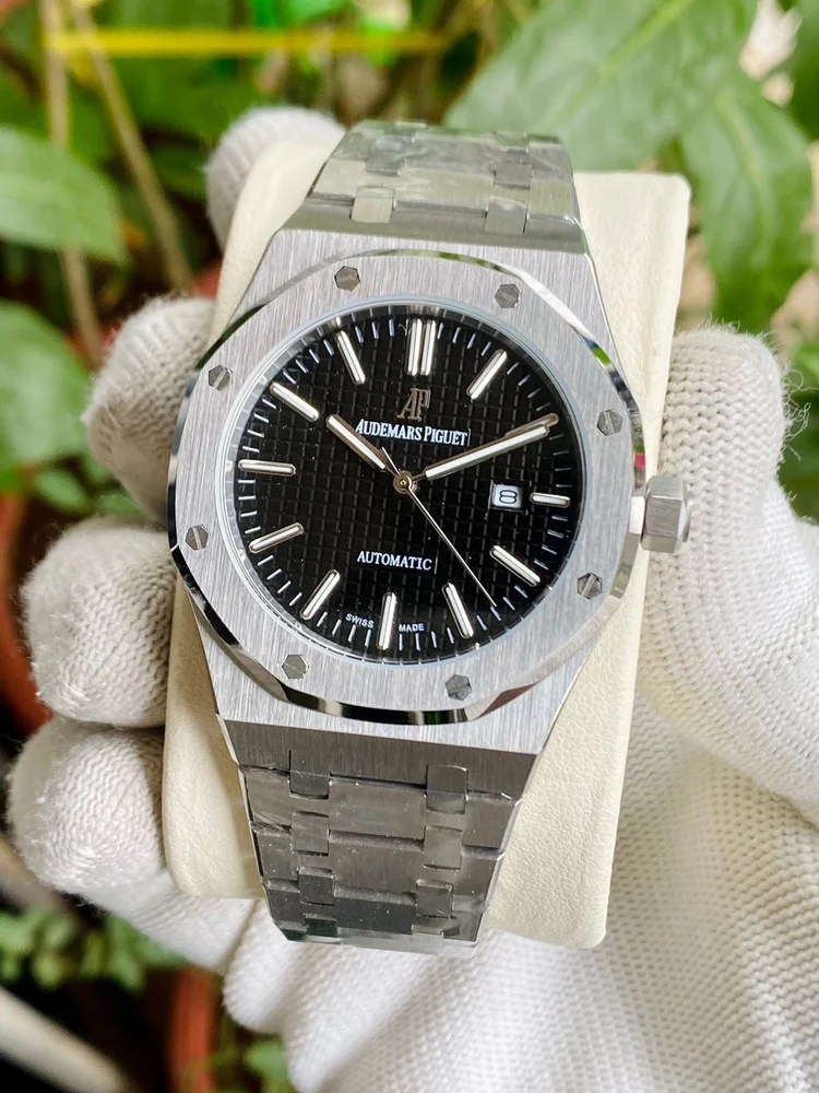 Audemars Piguet Royal Oak selfwinding watch with a black dial and stainless steel case and bracelet