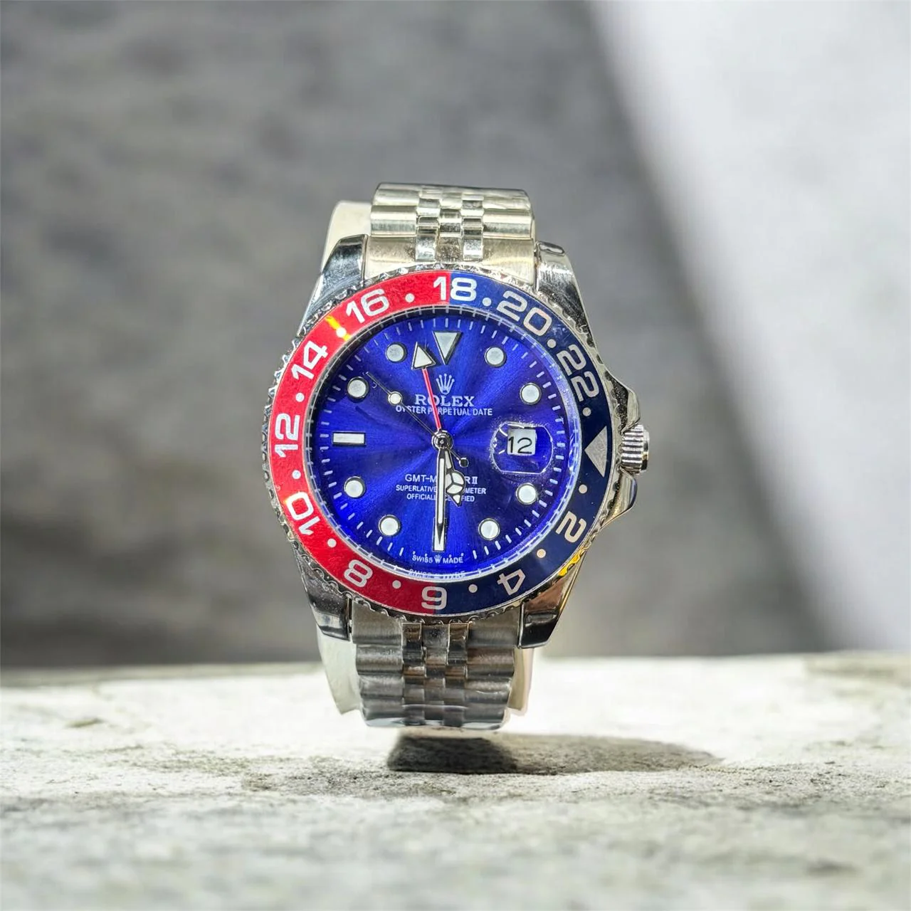 Rolex GMT-Master II Pepsi watch with a red and blue ceramic bezel insert and a Jubilee bracelet