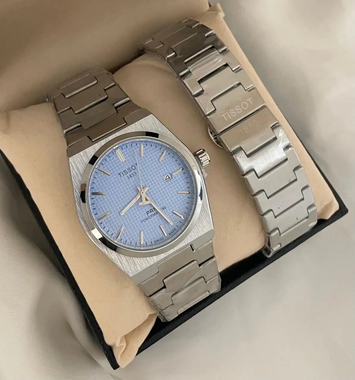 Tissot PRX Powermatic 80 watch with an ice-blue dial