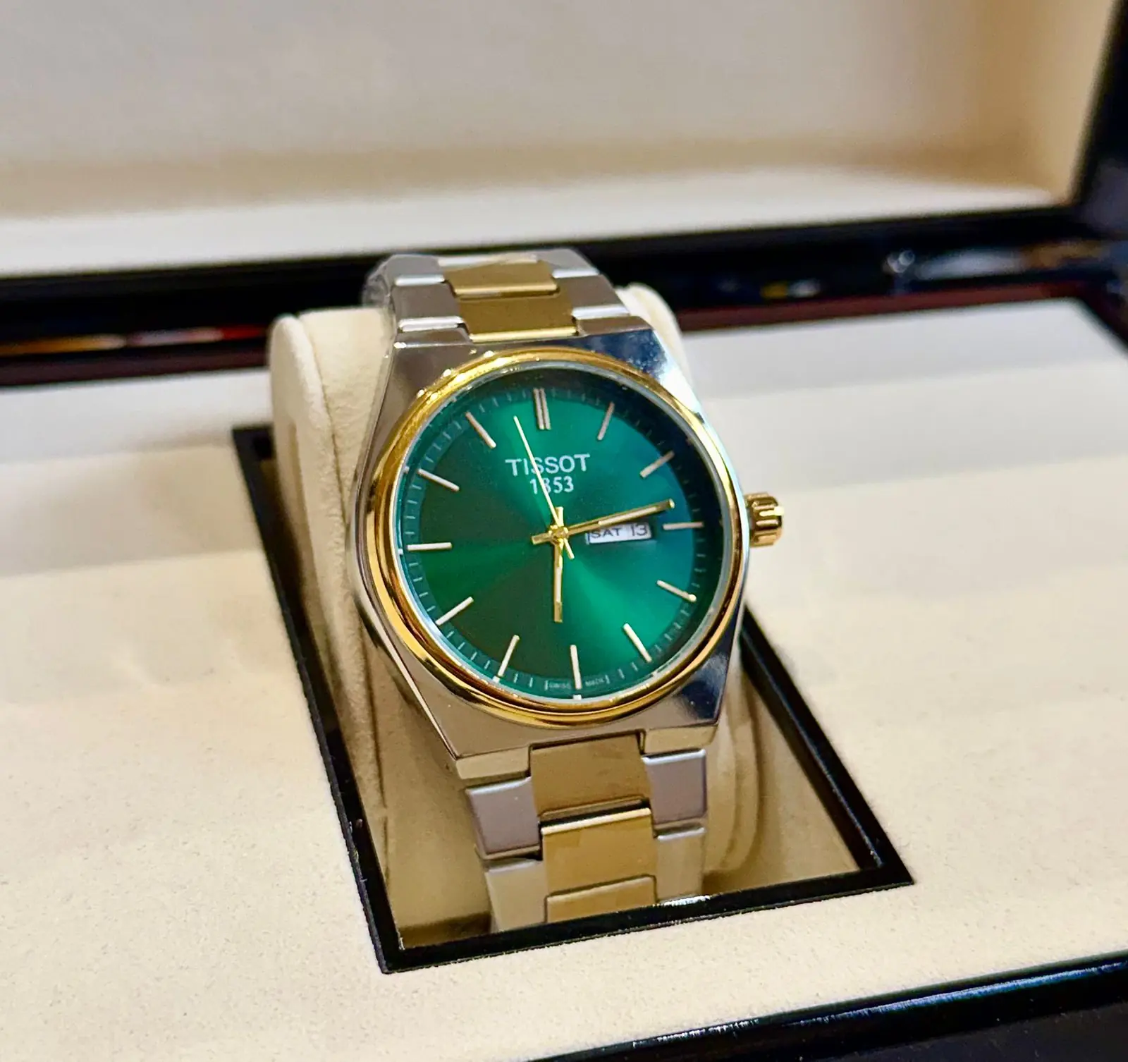Tissot PRX Watch with a Green Dial, integrated Two-Tone Stainless Steel and Gold PVD-coated Bracelet