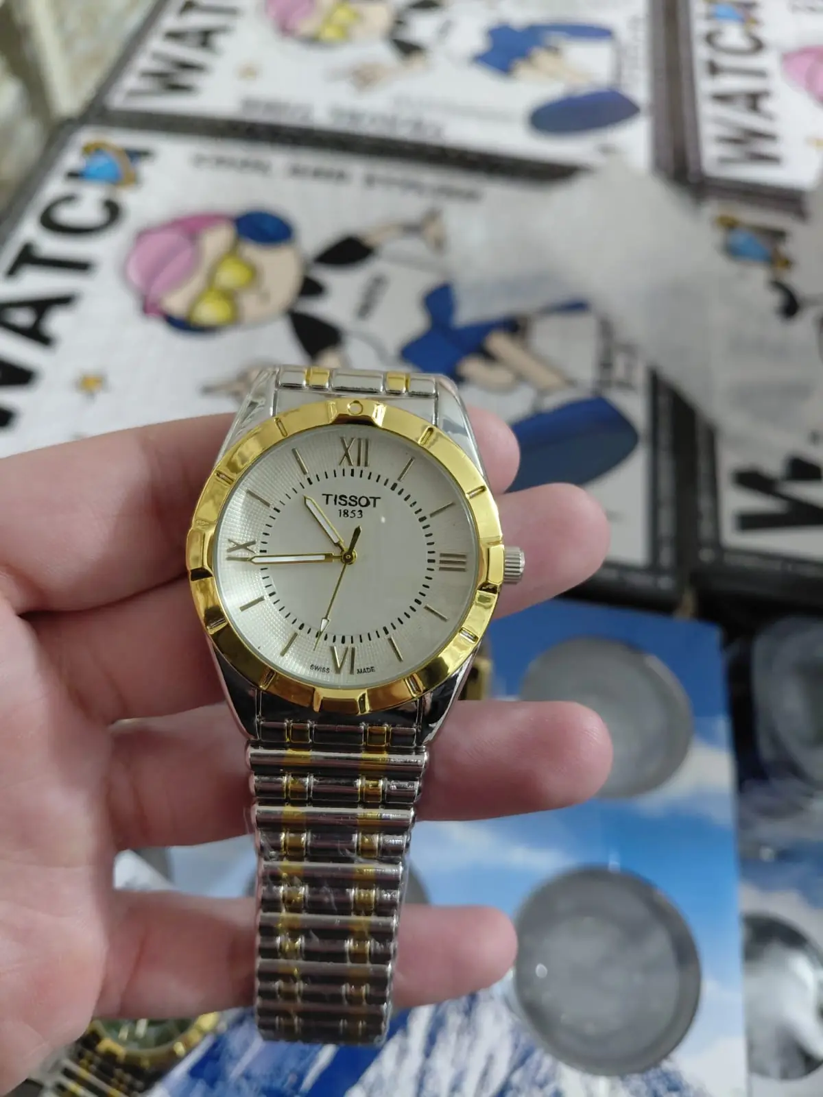 Tissot Lady Small Lady two-tone gold-plated stainless steel watch with a silver dial